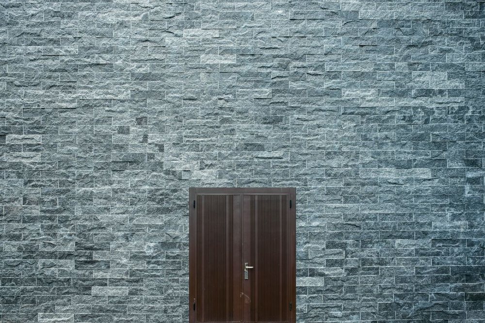 Granite stone-clad building façade