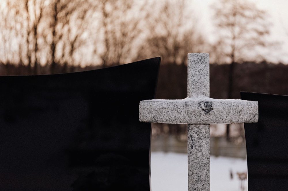 Granite memorial cross and headstones