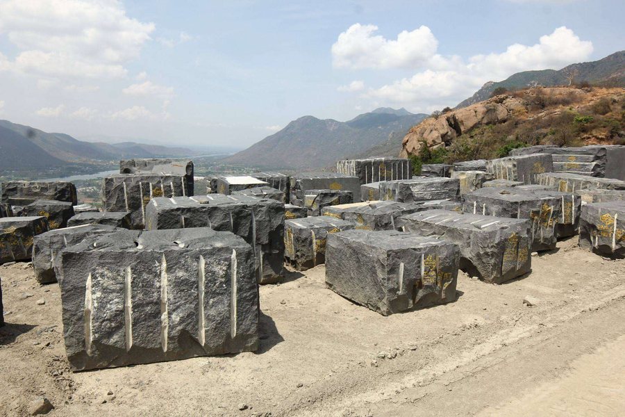 Granite raw blocks quarried at a TAMIN site