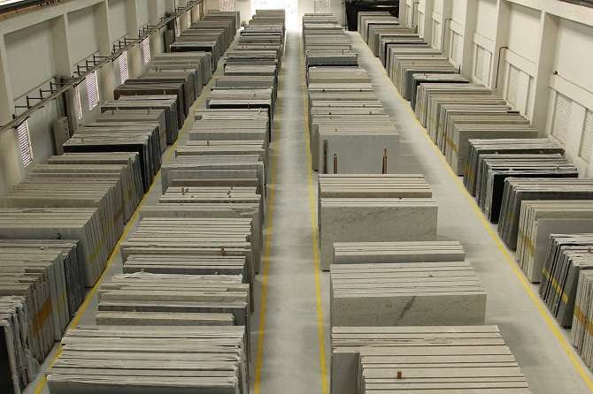 Finished granite slabs racked in the TAMIN slab yard
